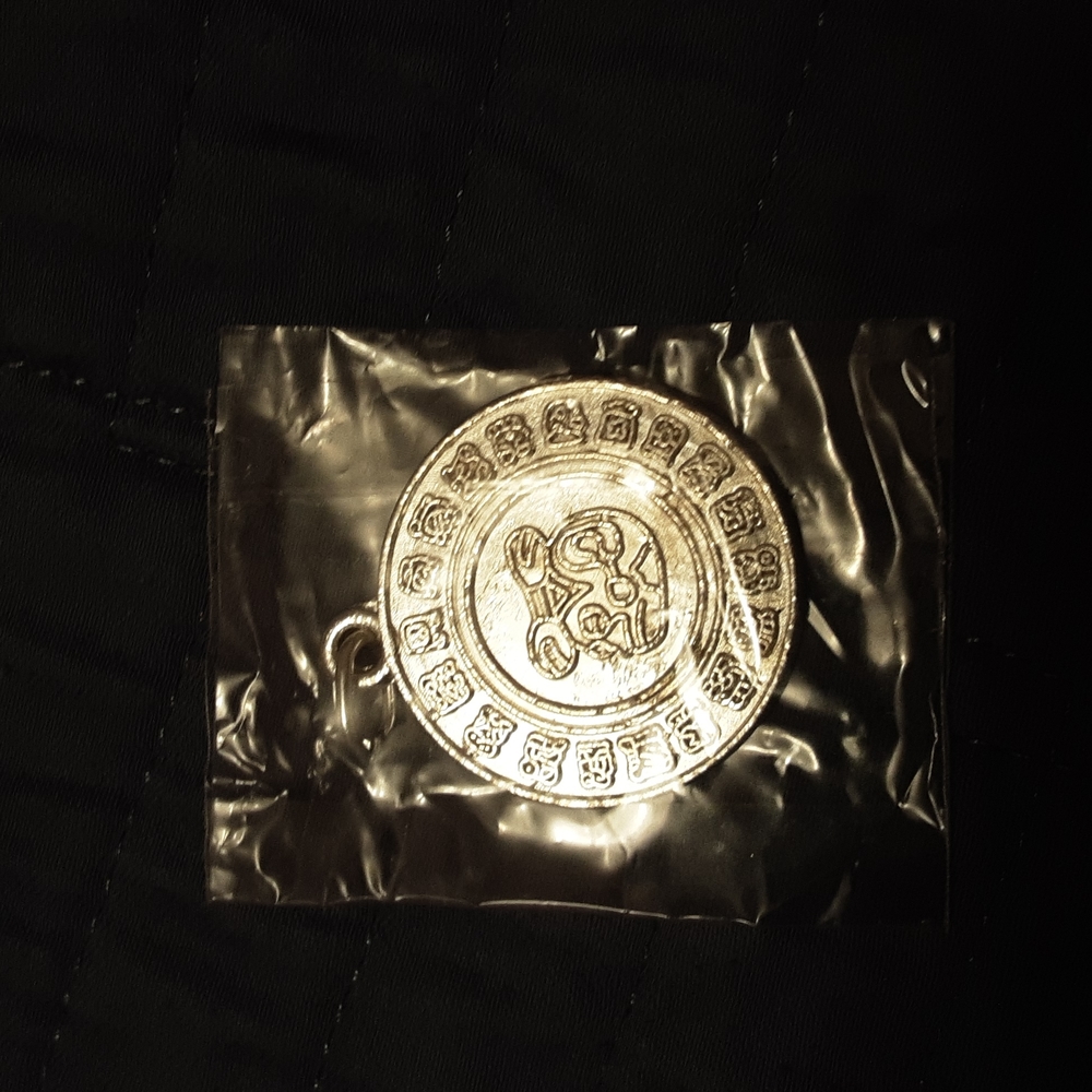 New In Package! Silver Plated Mayan Zodiac Pendant